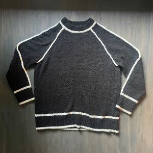 Elegant Black and White Turtleneck Sweater